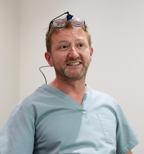Smiling dentist – teeth straightening at Everwell Dental