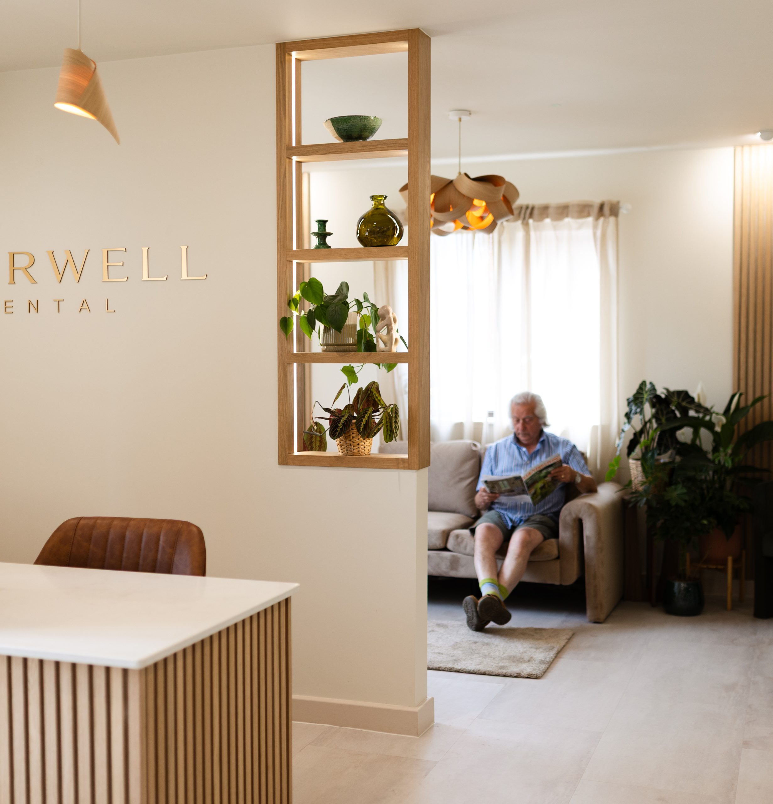 Patient relaxing in the Everwell Dental waiting area